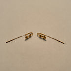 Nomi Earring i guldfarve med smeltede hjerter