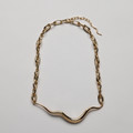 Ripple Statement Necklace i guldfarve